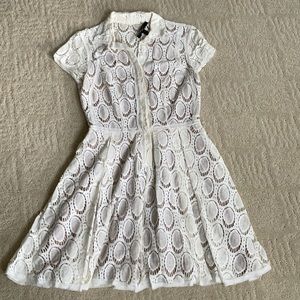 Ivory lace dress fully lined.